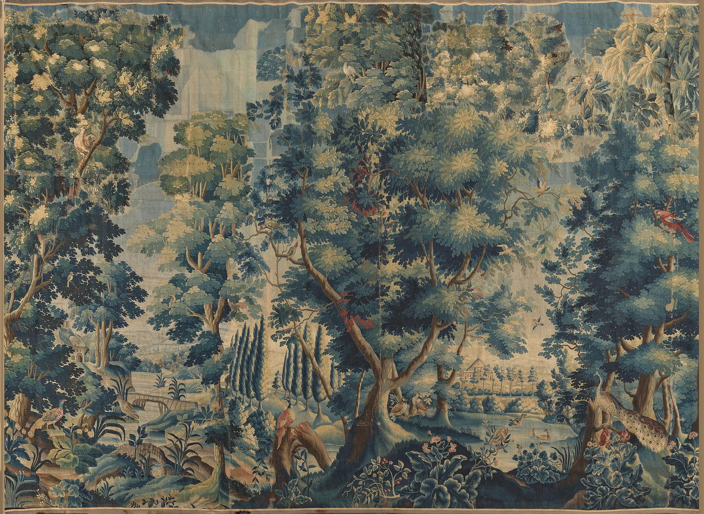 Perfect Verdure: A Late 17th Century Flemish Verdure Landscape Tapestry Featuring Exotic Birds Amidst a Lush Forest Setting with Stately Trees and Rolling Hills RE410591