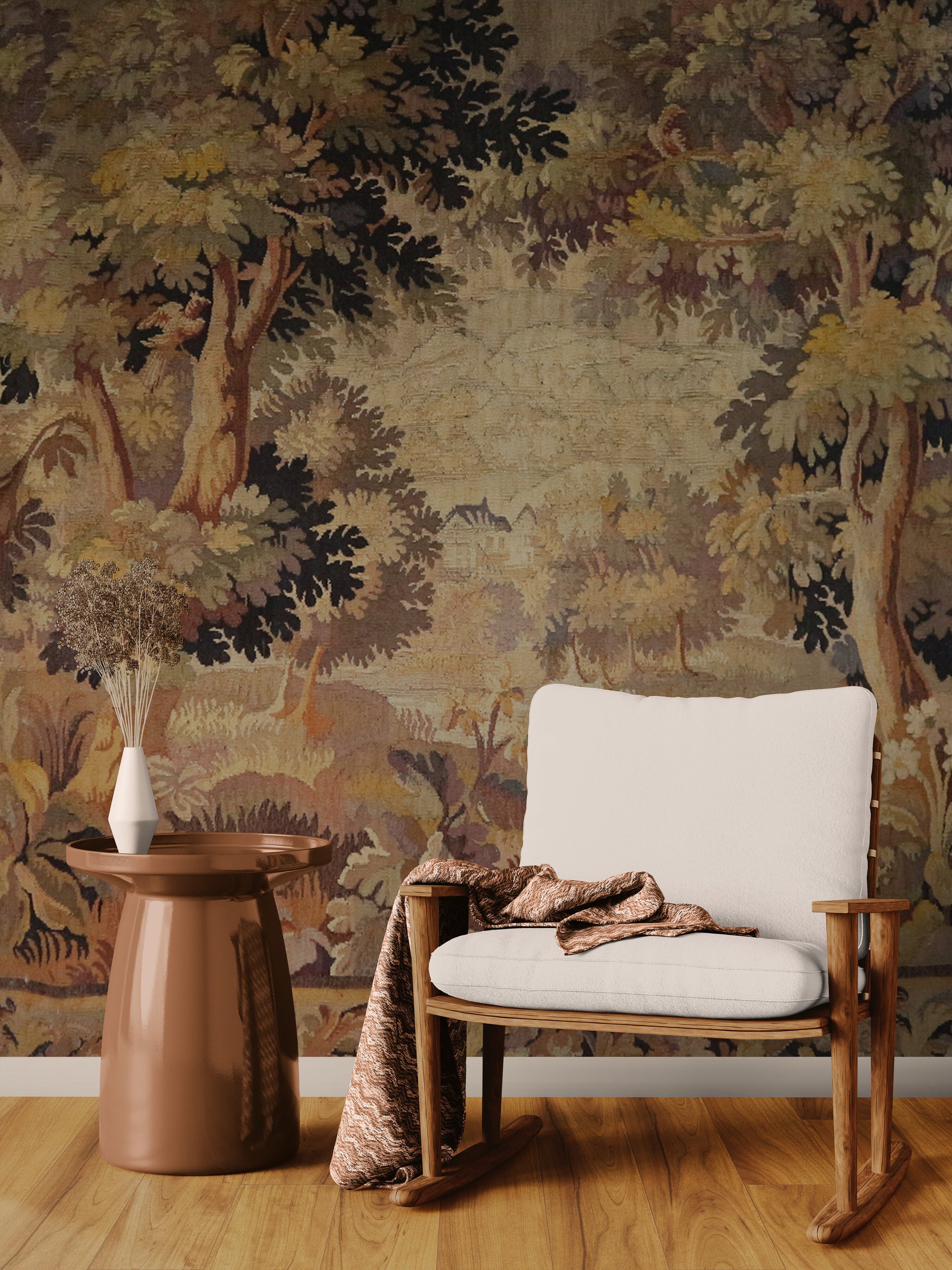 Wooden chair with white cushion and patterned throw against a forest-themed wallpaper.