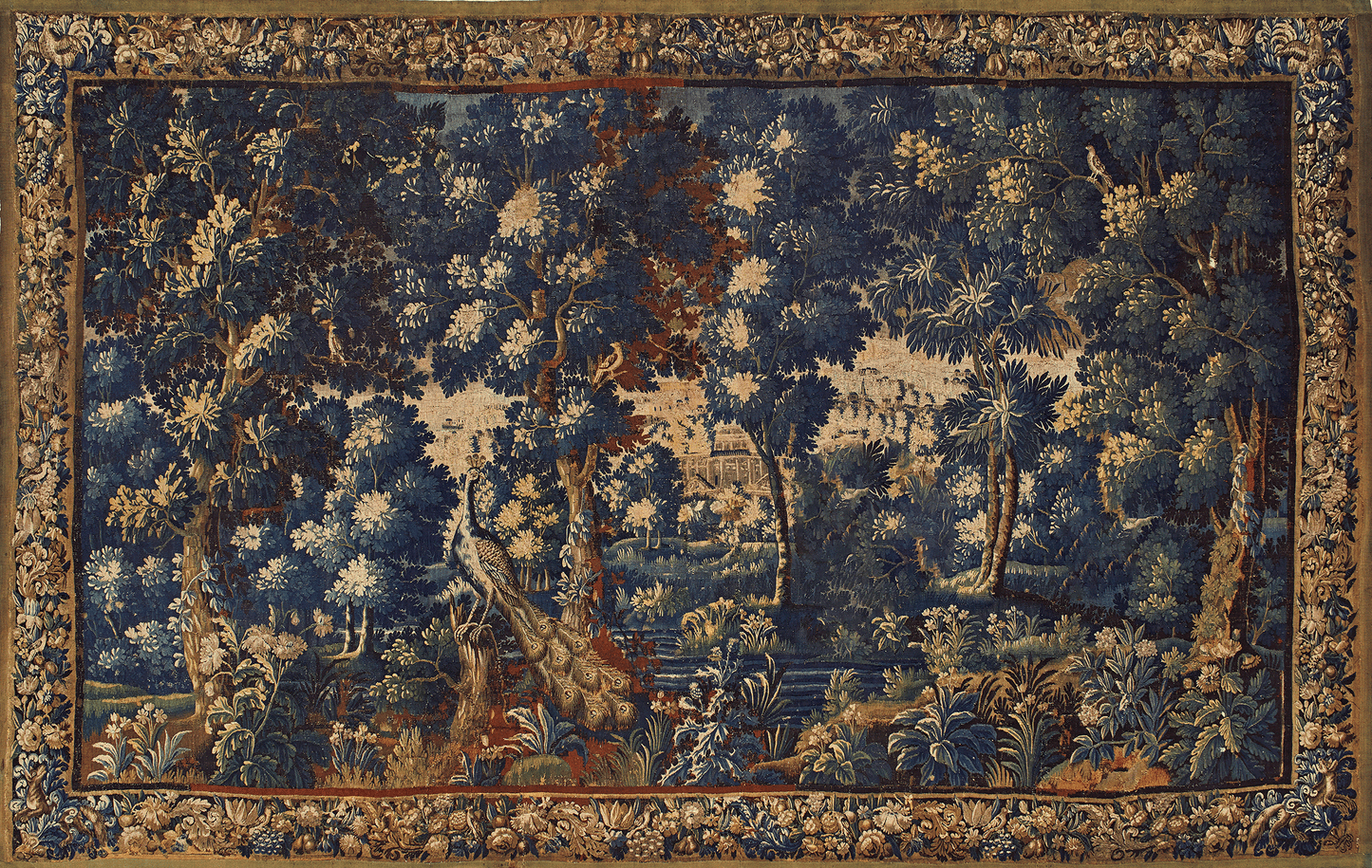 Decorative tapestry with a landscape design featuring trees and flowers on a blue background.