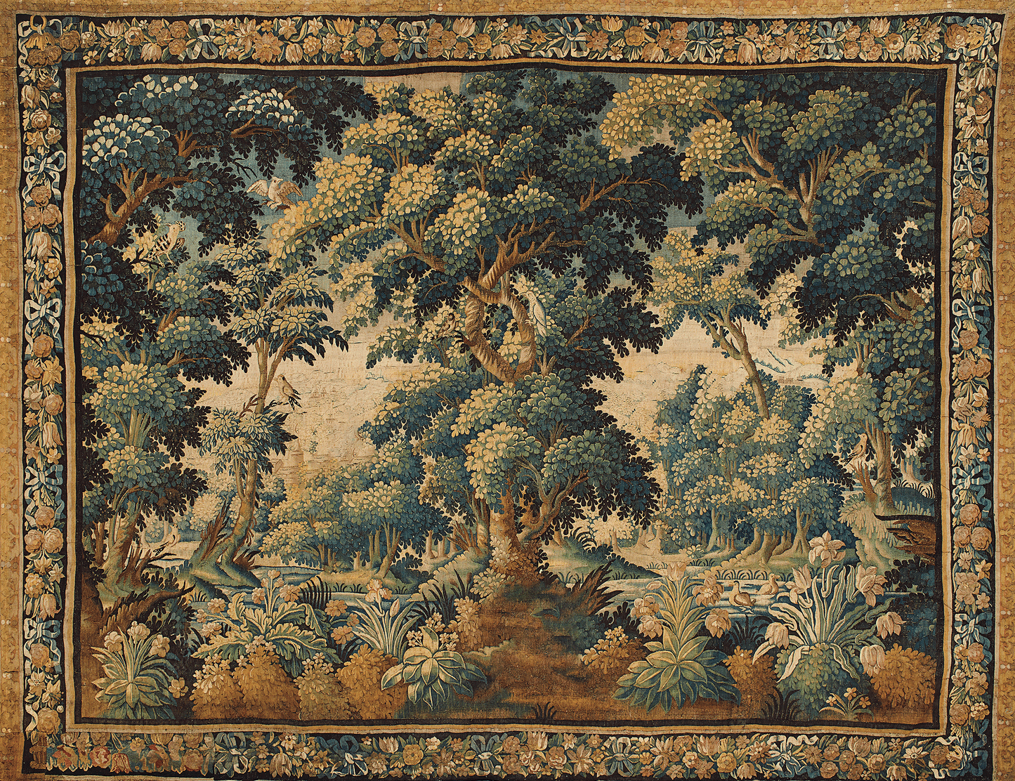 Decorative tapestry with a forest scene and intricate border