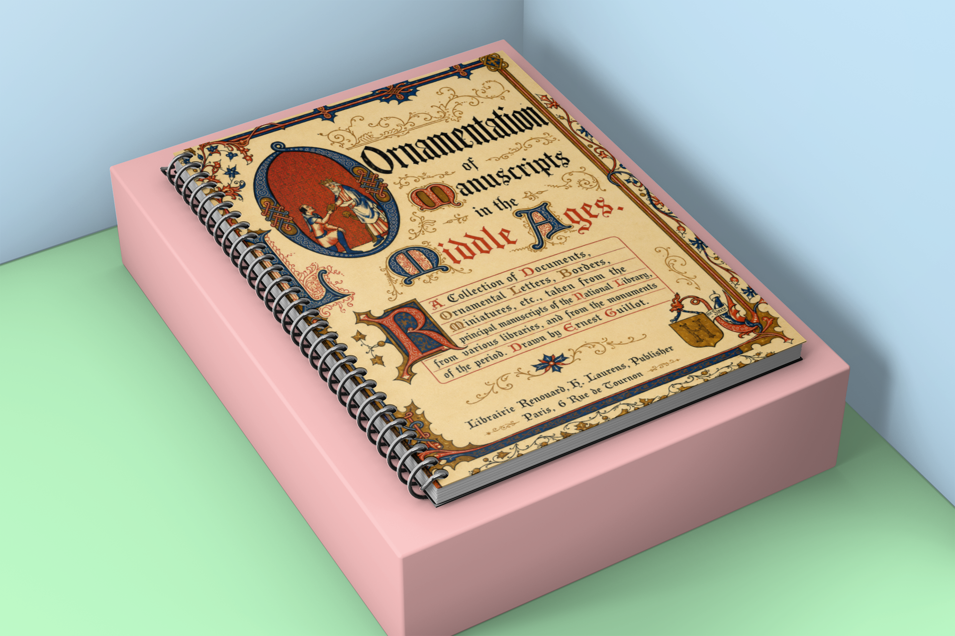 A spiral-bound book titled "Ornamentation of Manuscripts in the Middle Ages" displayed on a pink rectangular block against a light blue and mint green background.